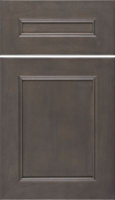 Eclipse Landes, A dark brown wooden cabinet door with a rectangular panel design and subtle raised trim on both the door and the drawer front above it