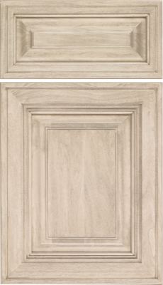 Eclipse Savannah, Rectangular, light wood cabinet doors with raised panels and decorative beveled edges; the top panel is smaller and horizontal, while the lower panel is larger and vertical