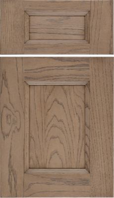 Eclipse Statesville, Two wooden cabinet doors are shown, one horizontal above a vertical one. Both have a natural wood grain pattern and a rectangular recessed panel design with a light brown finish