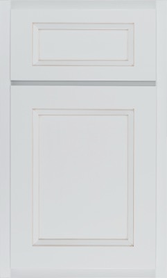 Shiloh Greensboro, A white kitchen cabinet door with a rectangular raised panel design and subtle decorative grooves, featuring a drawer panel above the main door