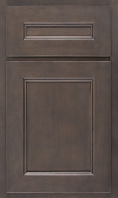 Shiloh Landes, A dark brown wooden cabinet door from MD Cabinets, featuring a rectangular raised panel design with decorative trim and a smaller matching panel above the main section