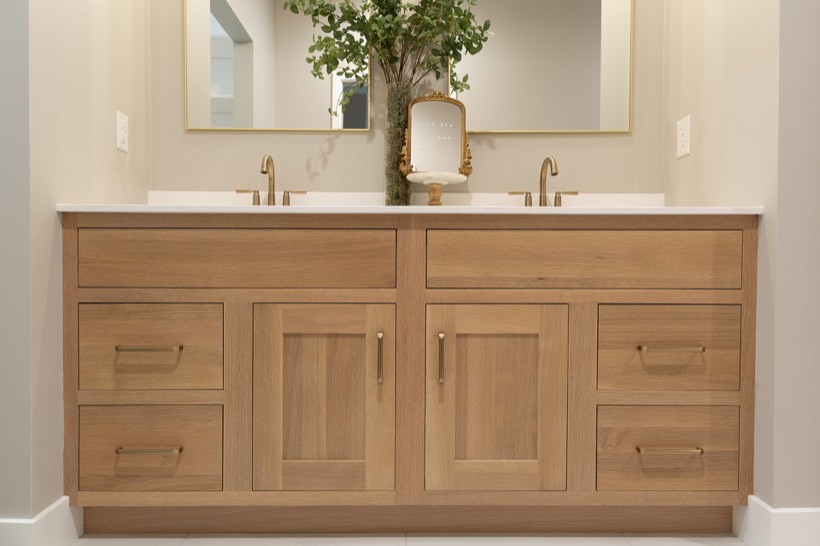 Shiloh cabinetry example, a modern bathroom vanity in features light wood cabinets