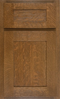Shiloh New Haven, A wooden cabinet door from Bethesda Cabinets with a raised central panel and rectangular, recessed border. The medium brown stain highlights the natural grain pattern, while straight lines create a clean, shaker style look