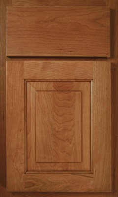 Shiloh Richmond, A close-up of a wooden kitchen cabinet door with a raised panel design