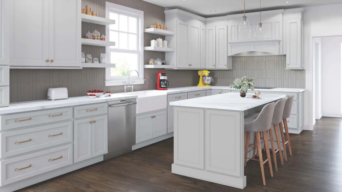 Kitchen by Bethesda Cabinets with full-overlay white cabinets, a farmhouse sink, a white island, and a subway-tile backsplash.
